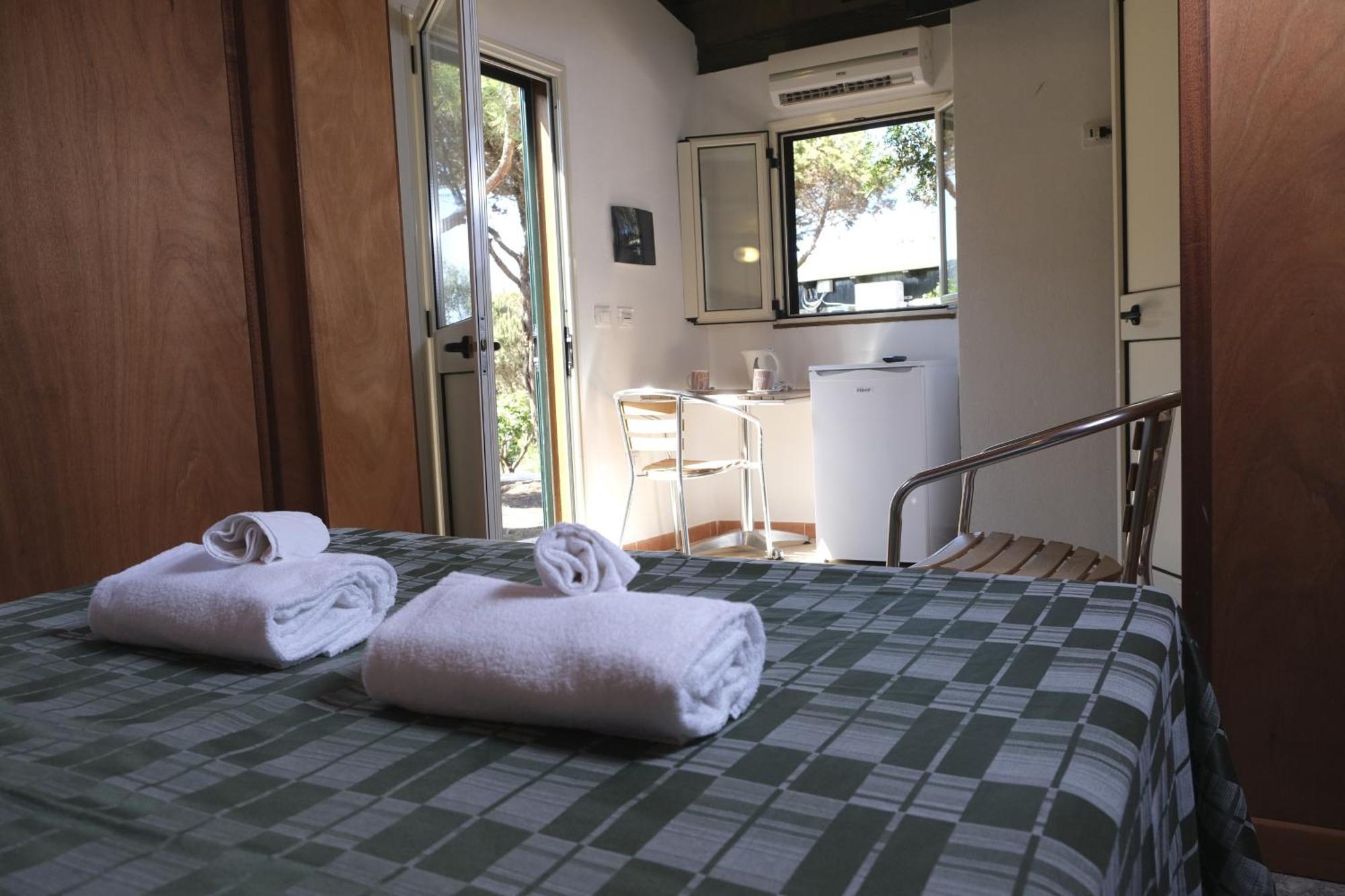 Villaggio Camping Torre Del Porticciolo Porto Conte Habitación foto